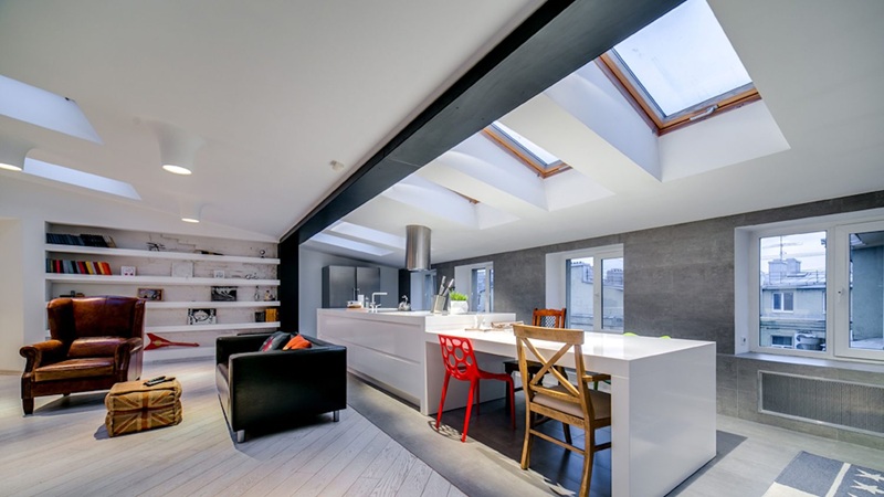 Modern living area with skylights showing natural light and summer comfort
